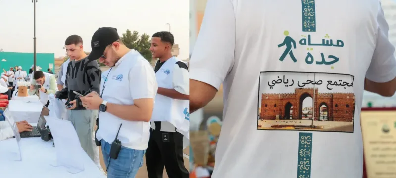 مصوّرون يعملون بكاميراتهم أثناء تغطية فعالية في جدة — تصوير معتز ساتي